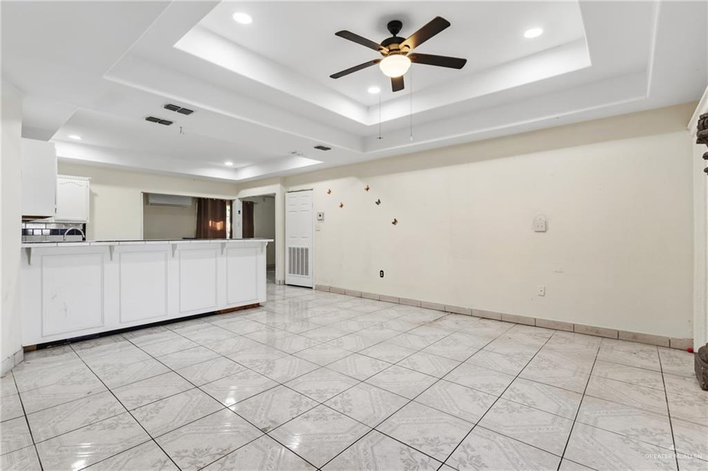 335 Watts Avenue Weslaco, TX 78596 - Photo 7 of 15 a view of a kitchen with a sink and dishwasher