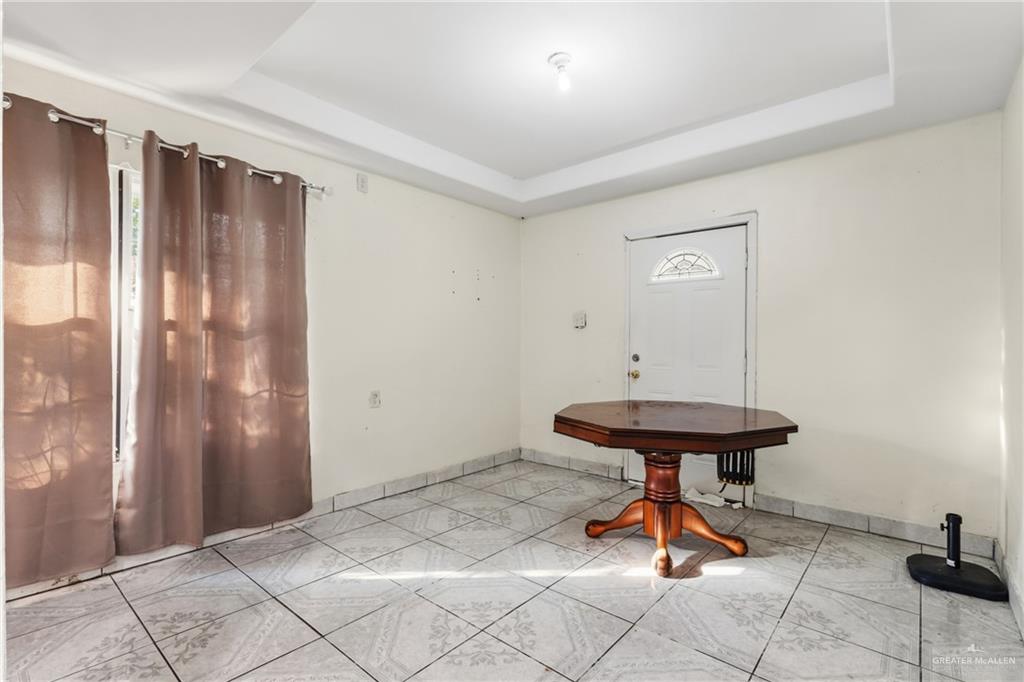 335 Watts Avenue Weslaco, TX 78596 - Photo 8 of 15 a view of a room with gym equipment