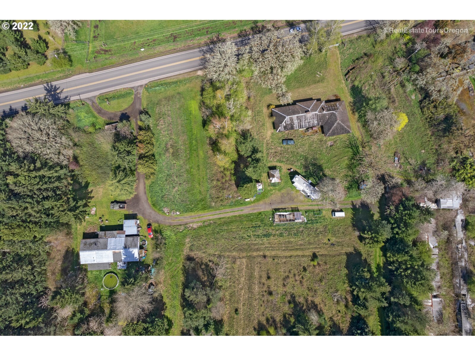 23940 Southwest Farmington Road Hillsboro, OR 97123 - Photo 5 of 13 an aerial view of residential house with outdoor space