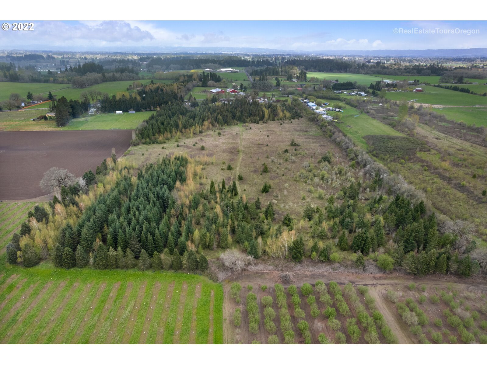 23940 Southwest Farmington Road Hillsboro, OR 97123 - Photo 6 of 13 a view of a field with an ocean