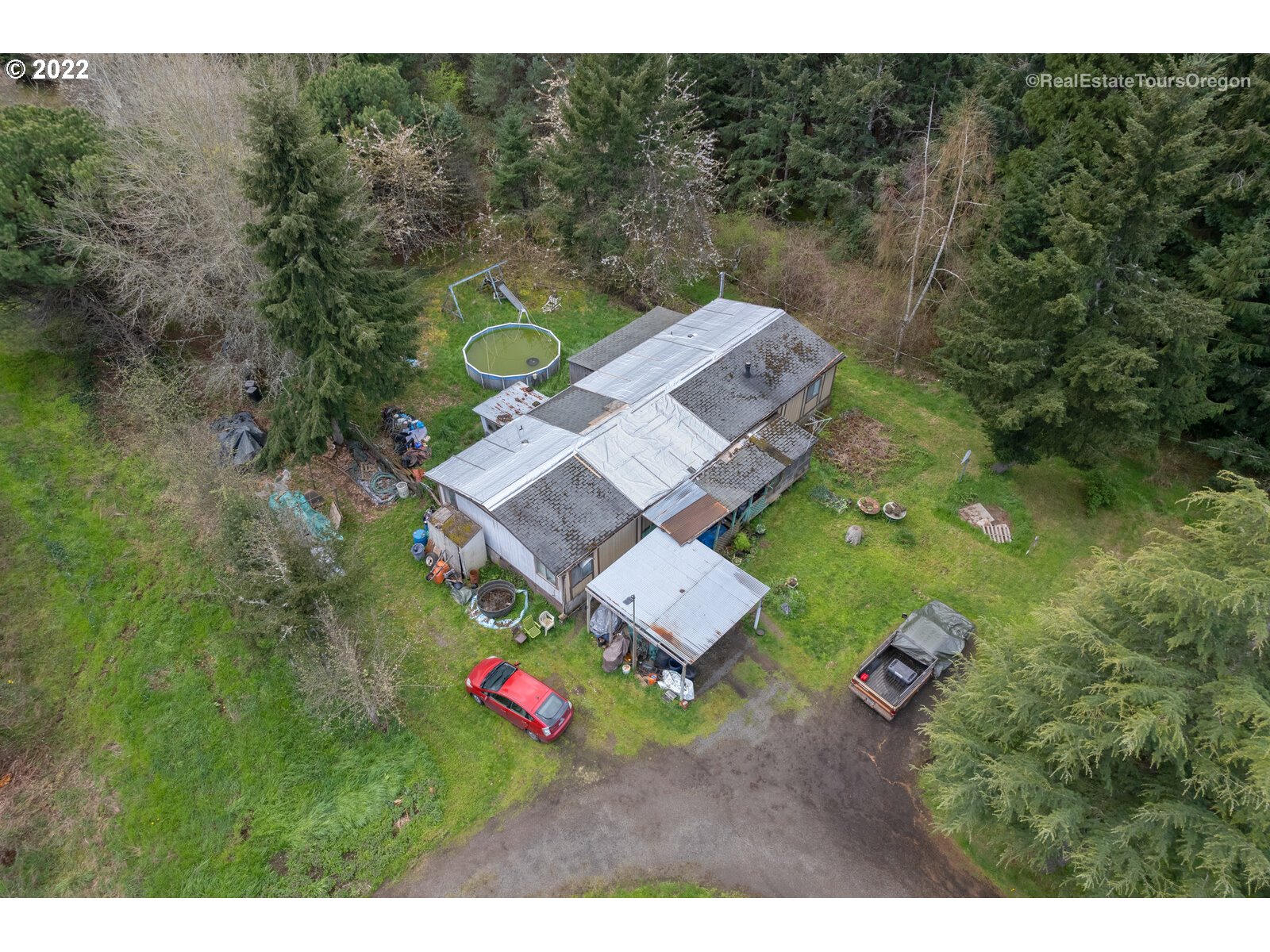 23940 Southwest Farmington Road Hillsboro, OR 97123 - Photo 9 of 13 a view of a house with a yard