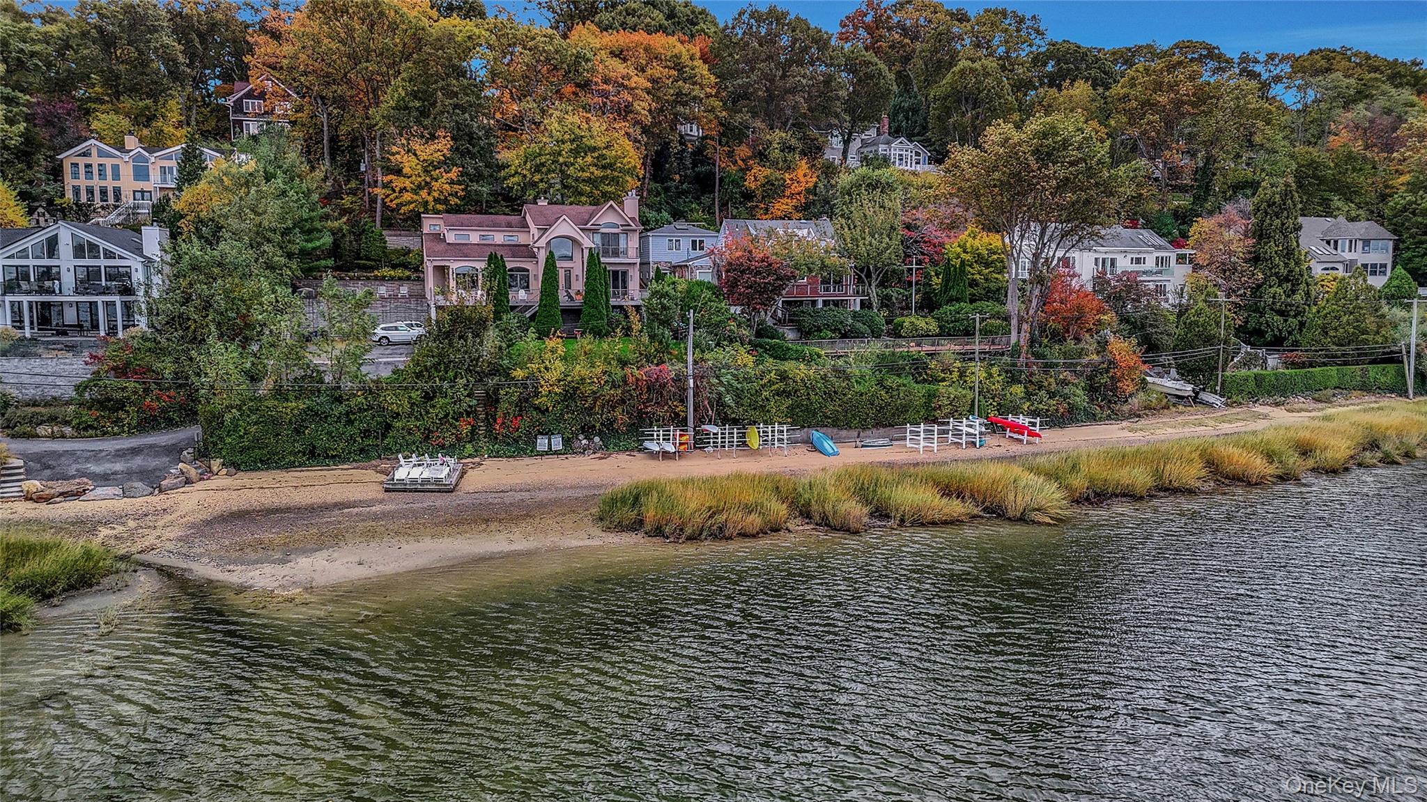 746 Sound View Road Mill Neck, NY 11765 - Photo 2 of 37 a view of swimming pool of a house with a yard