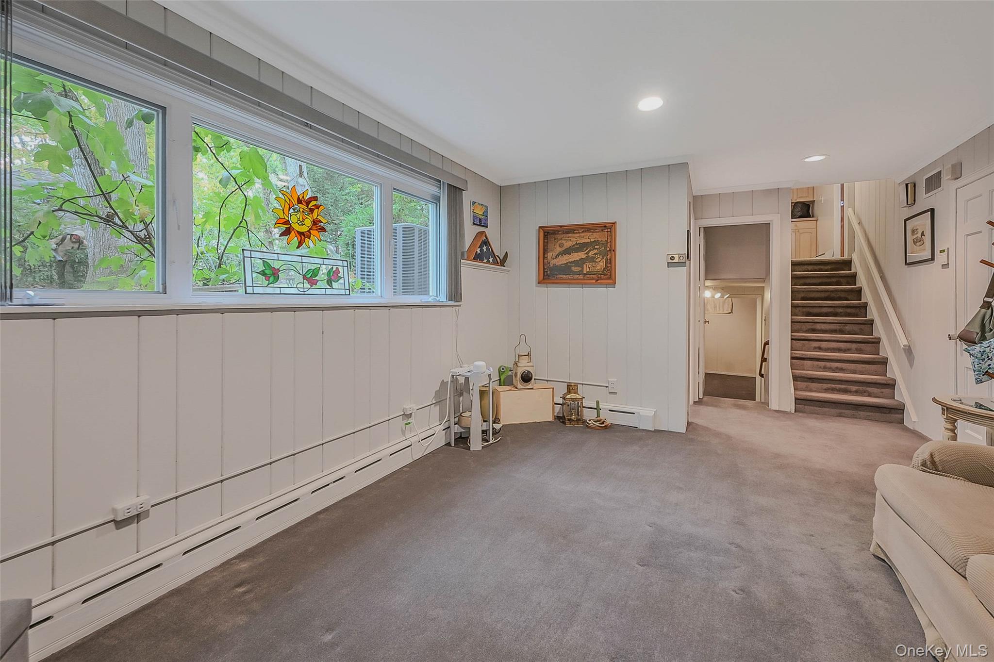 746 Sound View Road Mill Neck, NY 11765 - Photo 25 of 37 a view of an empty room with a window
