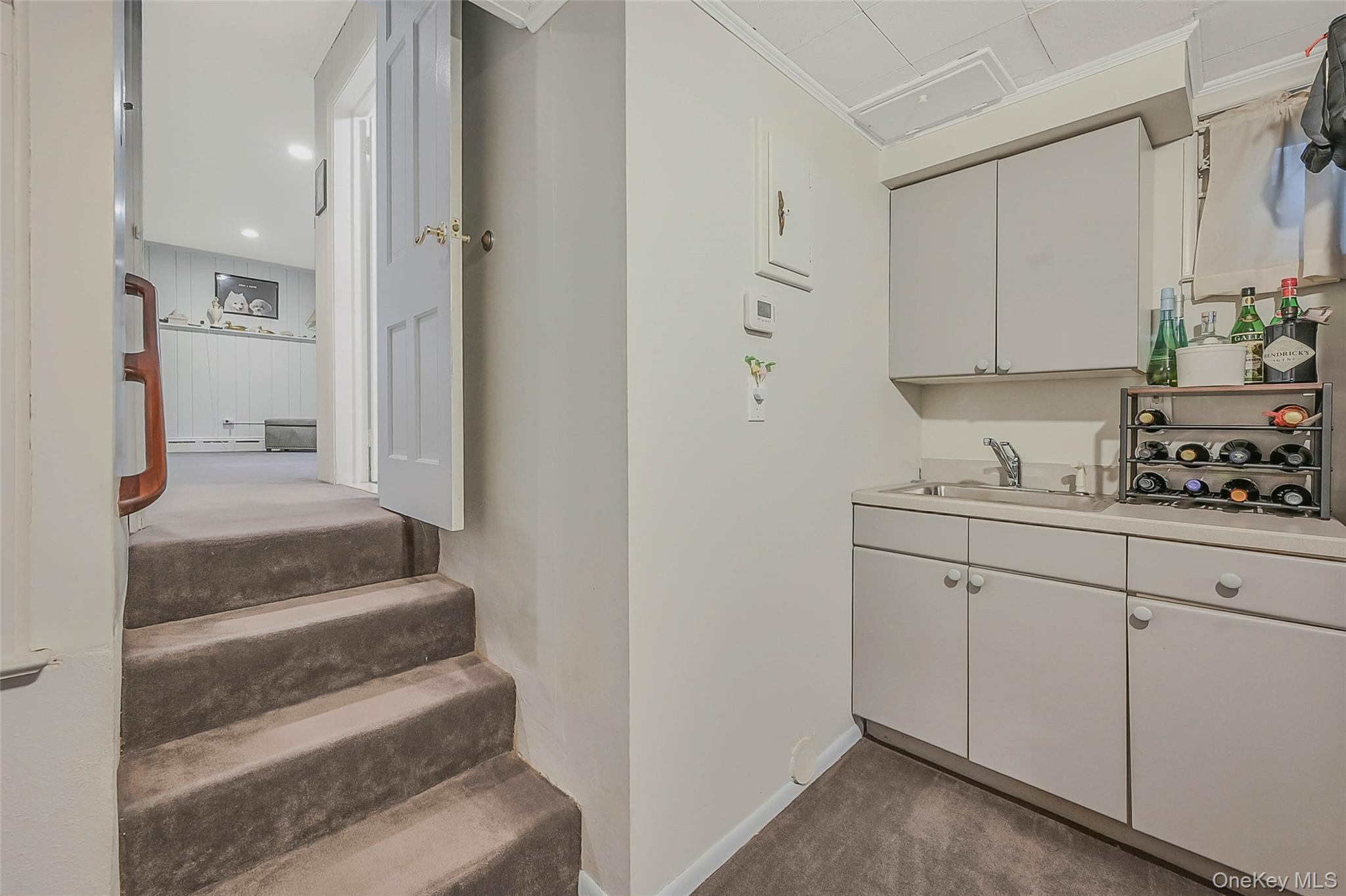 746 Sound View Road Mill Neck, NY 11765 - Photo 27 of 37 a bathroom with a sink and mirror