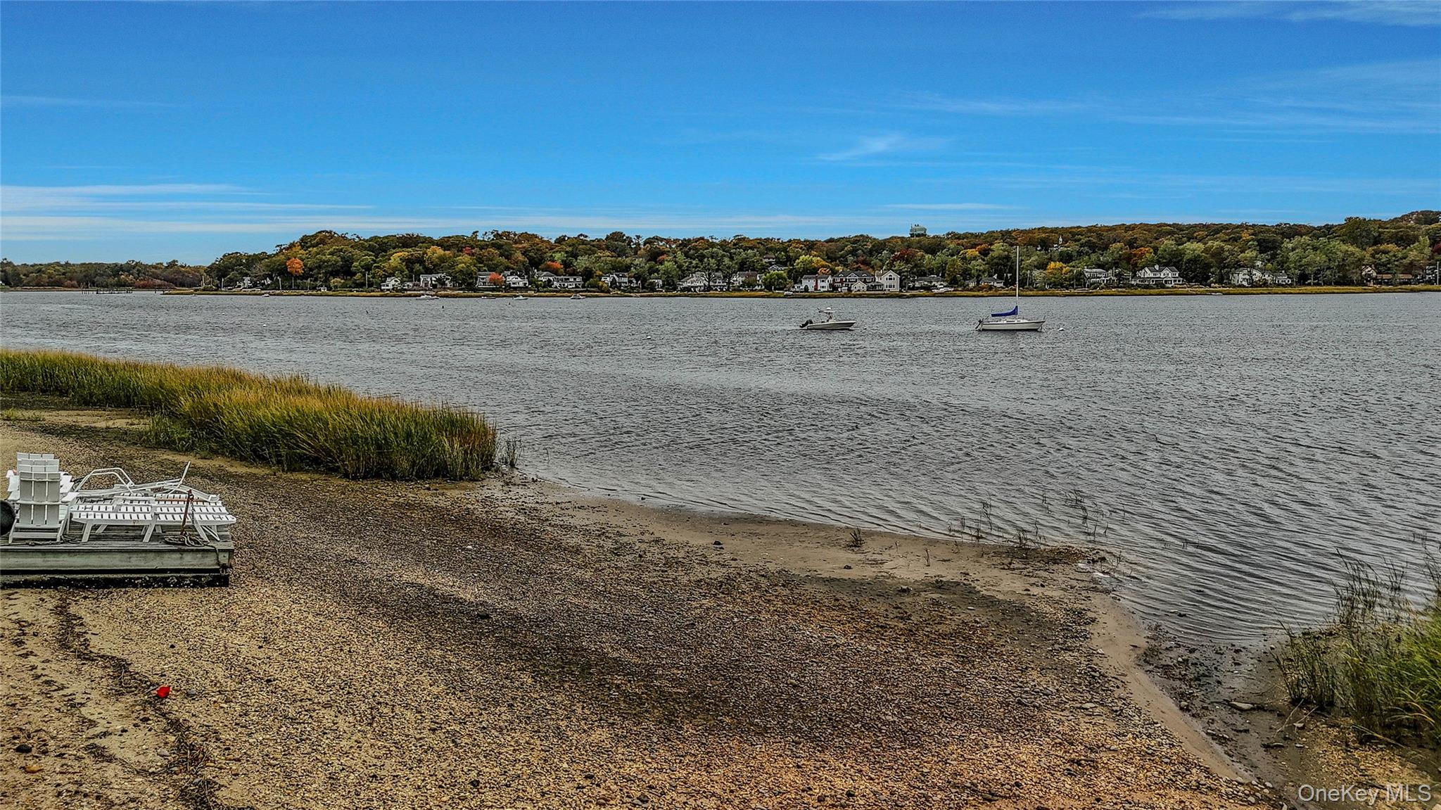 746 Sound View Road Mill Neck, NY 11765 - Photo 5 of 37 a view of lake with mountain in the background