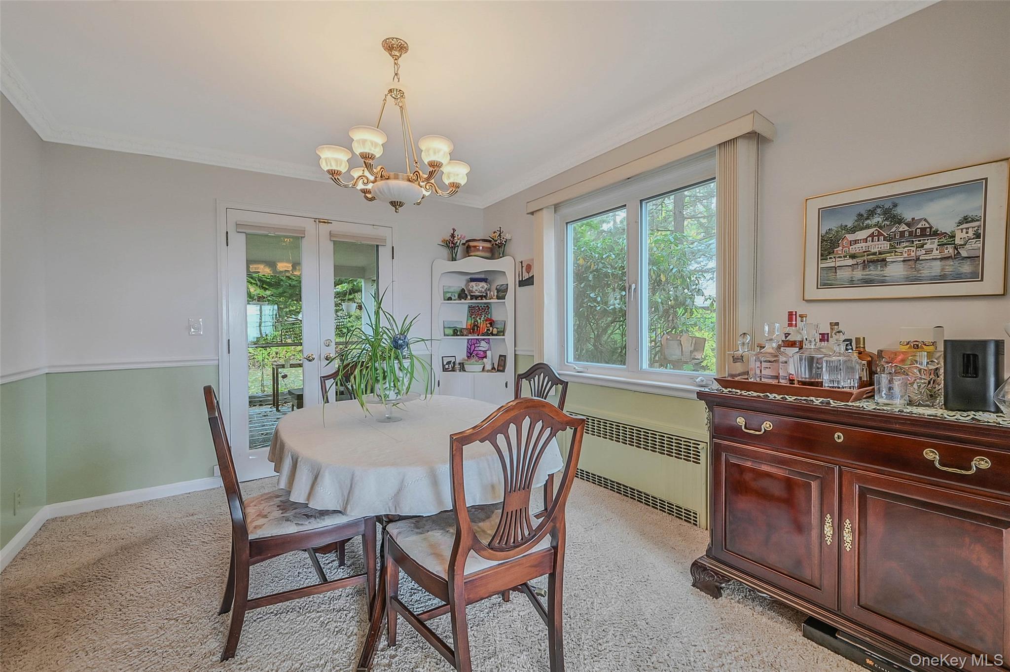 746 Sound View Road Mill Neck, NY 11765 - Photo 10 of 37 a view of a dining room with furniture window and outside view
