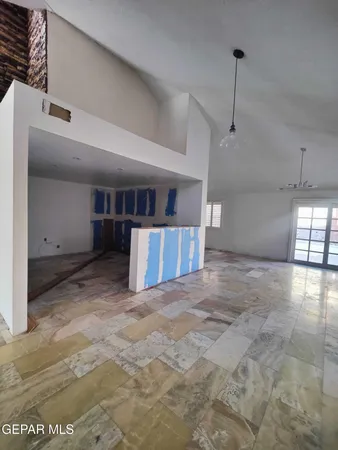 a view of a hallway with white walls