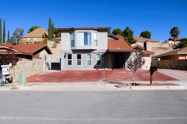 a front view of a house with entertaining space