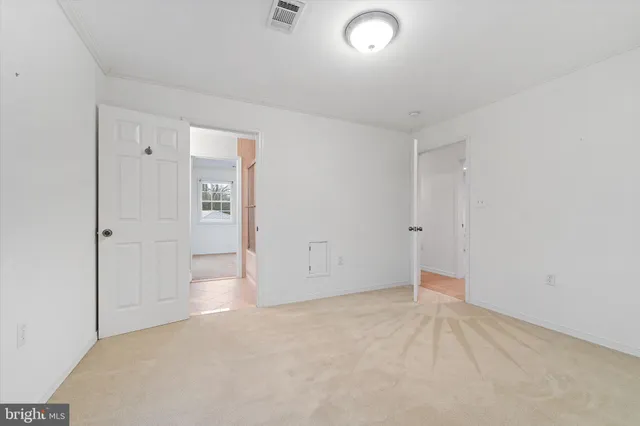 an empty room with an entryway