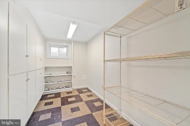 a room with a white and black white walls