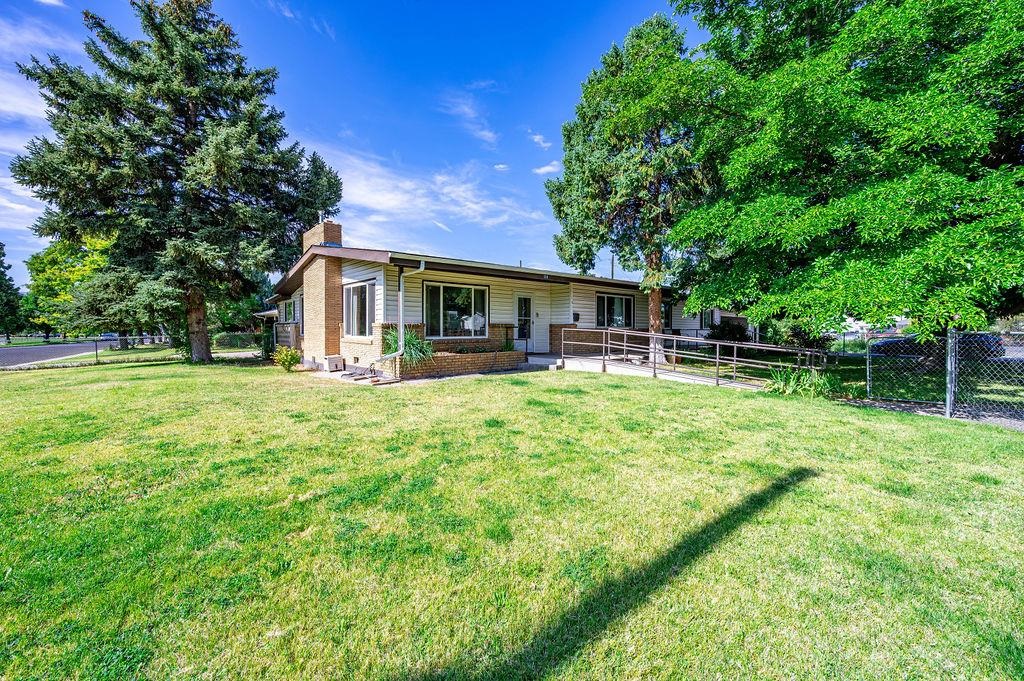 181 Elm Avenue Grand Junction, CO 81501 - Photo 1 of 25 a front view of house with yard and seating area