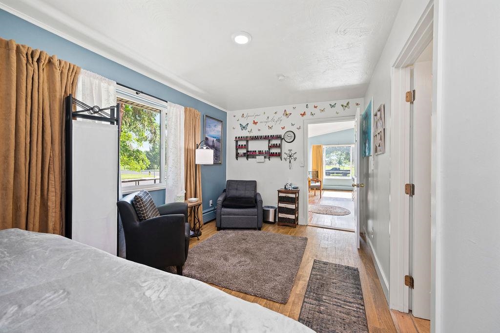 181 Elm Avenue Grand Junction, CO 81501 - Photo 12 of 25 a living room with furniture and large windows