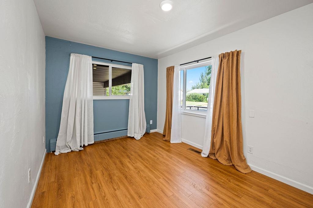 181 Elm Avenue Grand Junction, CO 81501 - Photo 17 of 25 a view of an empty room with windows