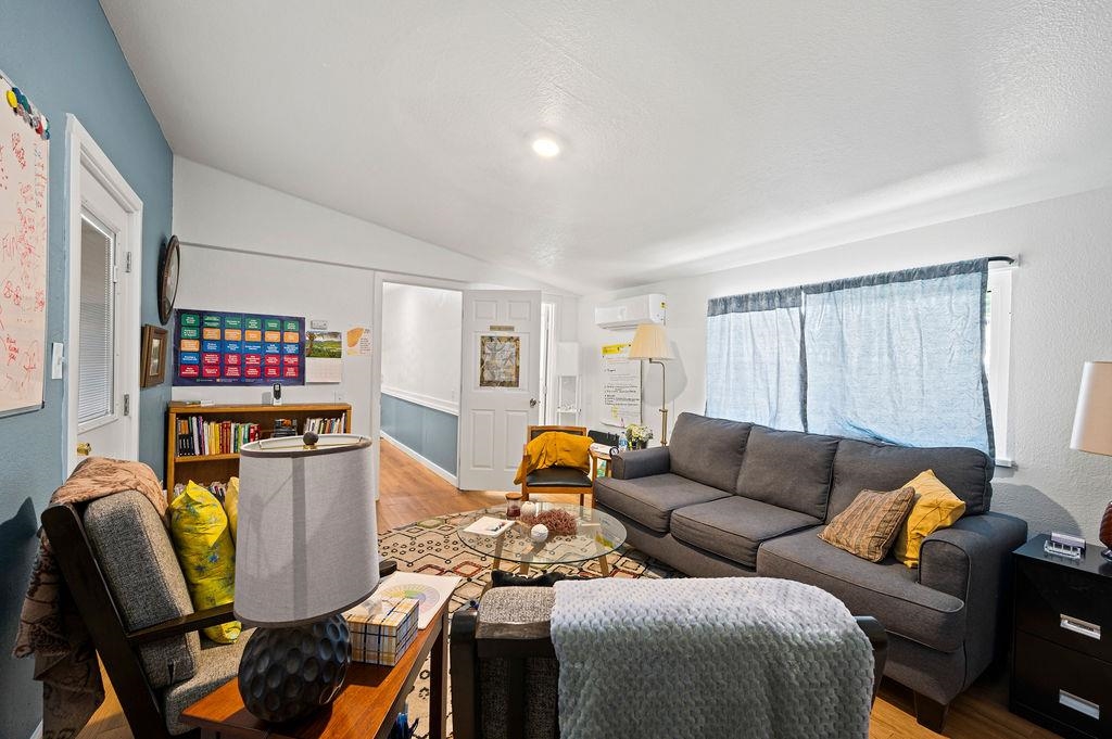 181 Elm Avenue Grand Junction, CO 81501 - Photo 21 of 25 a living room with furniture and a window
