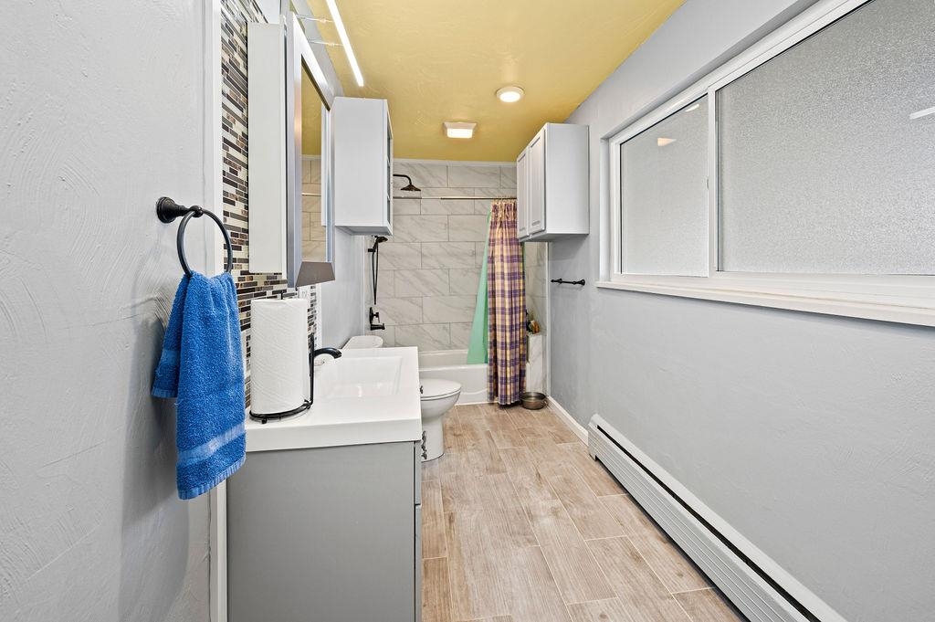 181 Elm Avenue Grand Junction, CO 81501 - Photo 22 of 25 a view of a kitchen cabinets and wooden floor