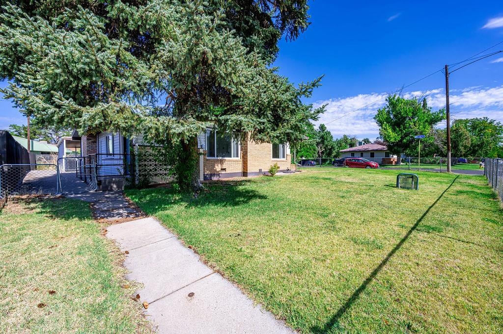 181 Elm Avenue Grand Junction, CO 81501 - Photo 24 of 25 a view of a backyard with sitting area