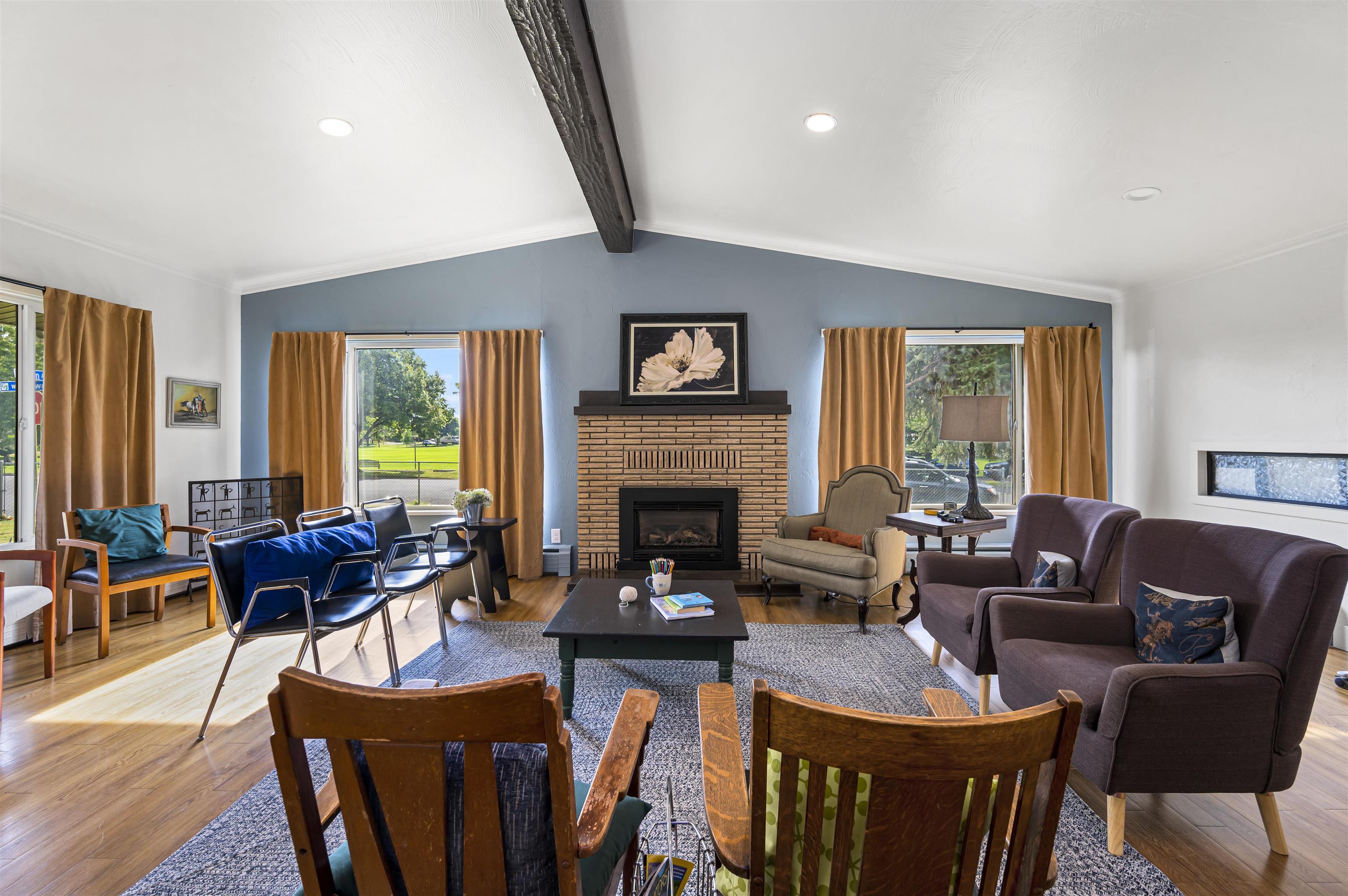 181 Elm Avenue Grand Junction, CO 81501 - Photo 4 of 25 a living room with furniture fireplace and a large window