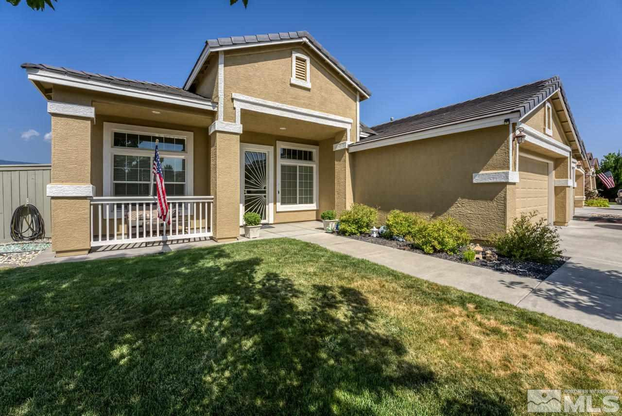 10395 Canyon Country Road Reno, NV 89521 - Photo 3 of 31 a front view of a house with a yard