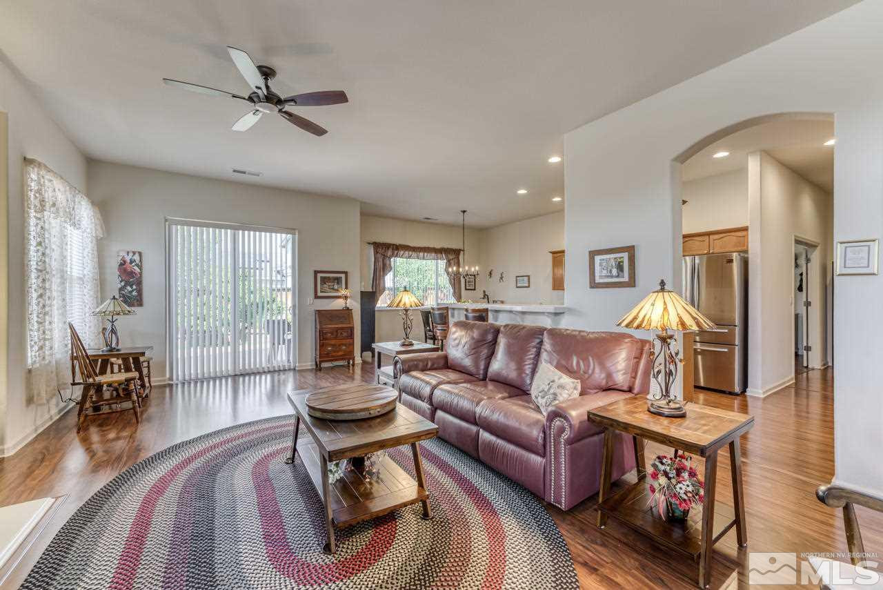 10395 Canyon Country Road Reno, NV 89521 - Photo 10 of 31 a living room with furniture and wooden floor