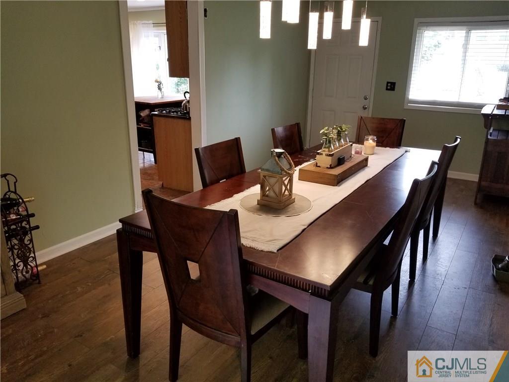 162 Princeton Road Old Bridge, NJ 08859 - Photo 8 of 23 a dining room with furniture and wooden floor