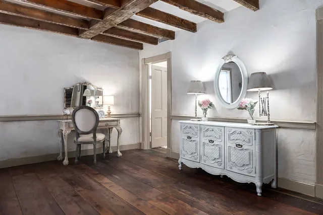 a kitchen with cabinets a sink and appliances