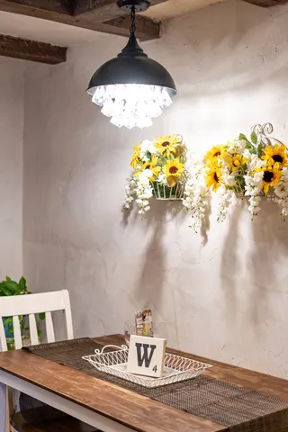 a vase of flowers sitting on a table