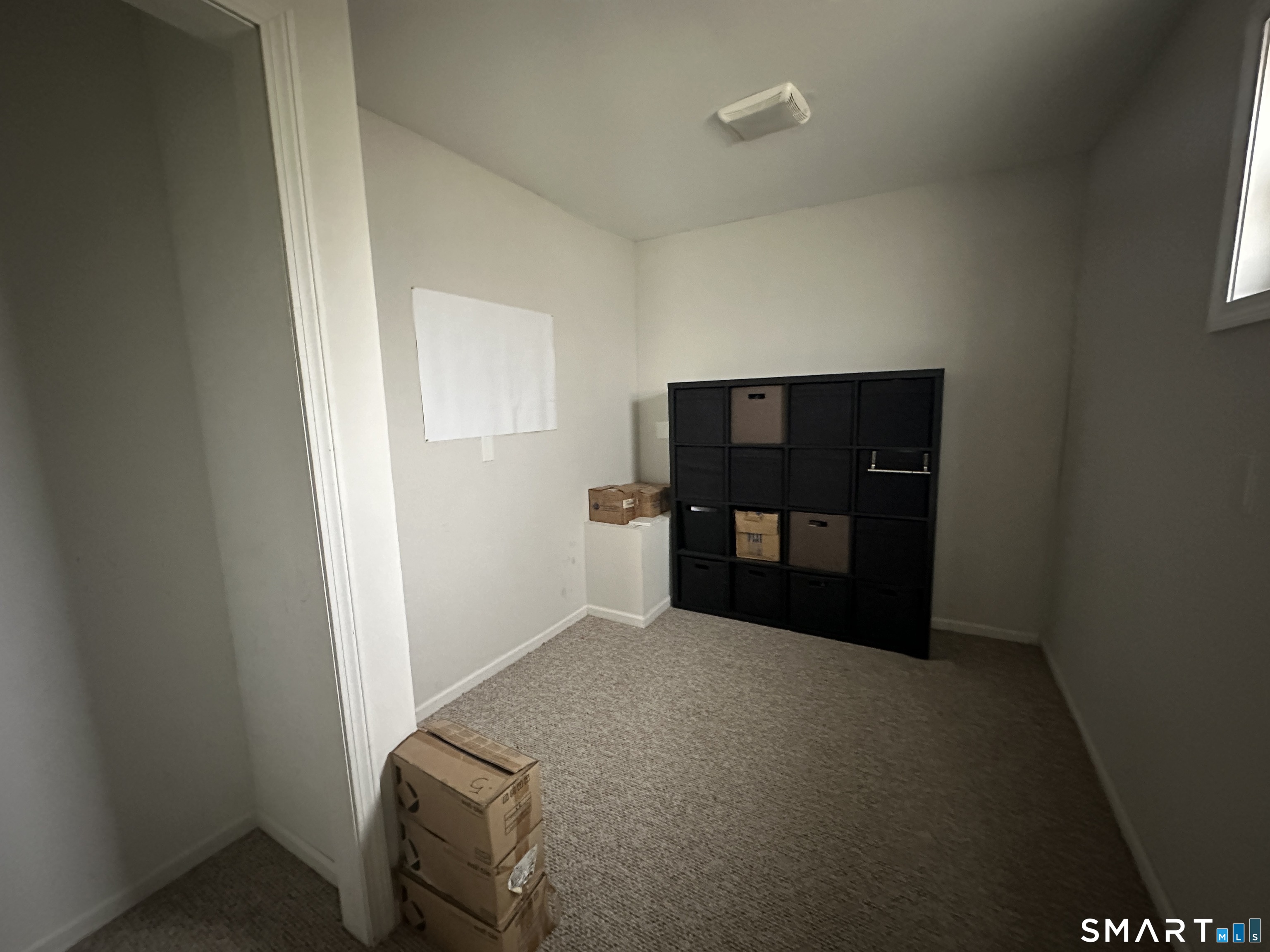 30 King Street Wallingford, CT 06492 - Photo 18 of 23 a view of empty room with cabinet