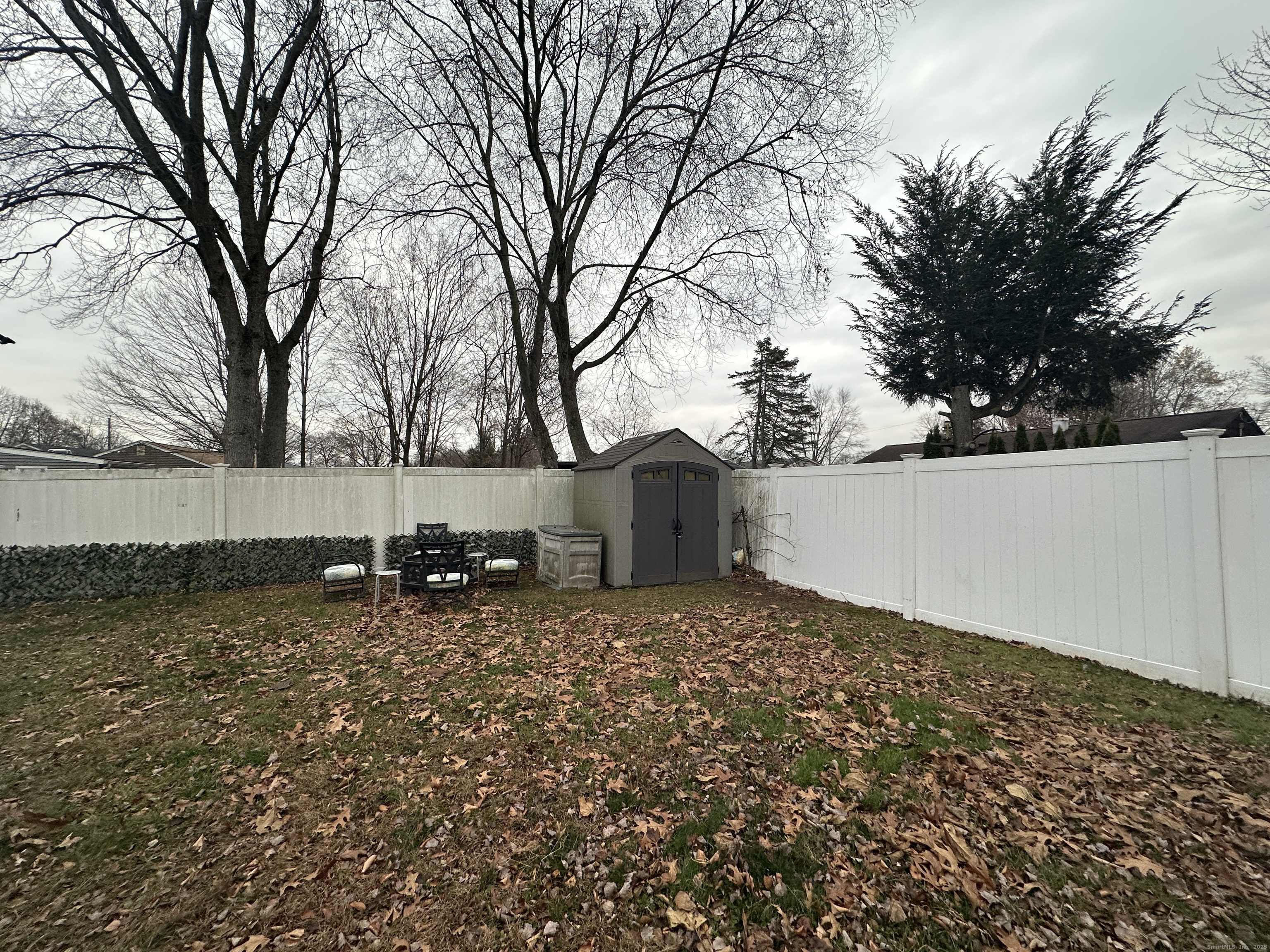 30 King Street Wallingford, CT 06492 - Photo 23 of 23 a backyard of a house with lots of green space