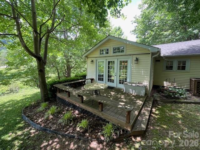 271 Wiggins Road Candler, NC 28715 - Photo 14 of 19 a front view of a house with garden