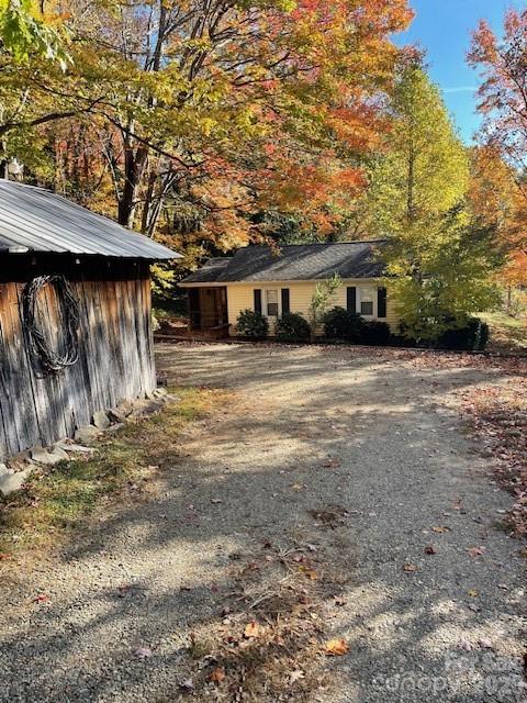 271 Wiggins Road Candler, NC 28715 - Photo 4 of 19 a view of a house with a outdoor space