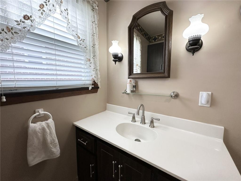 715 Longfellow St Extension Vandergrift, PA 15690 - Photo 36 of 40 Nice counter space and storage in bathroom