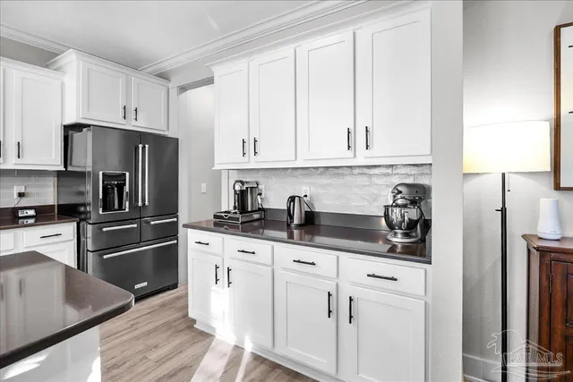 an aerial view of a house with a swimming pool