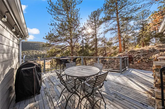 a view of a chairs and tables in the balcony