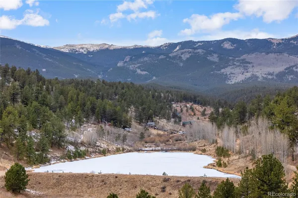 a view of a backyard of a house