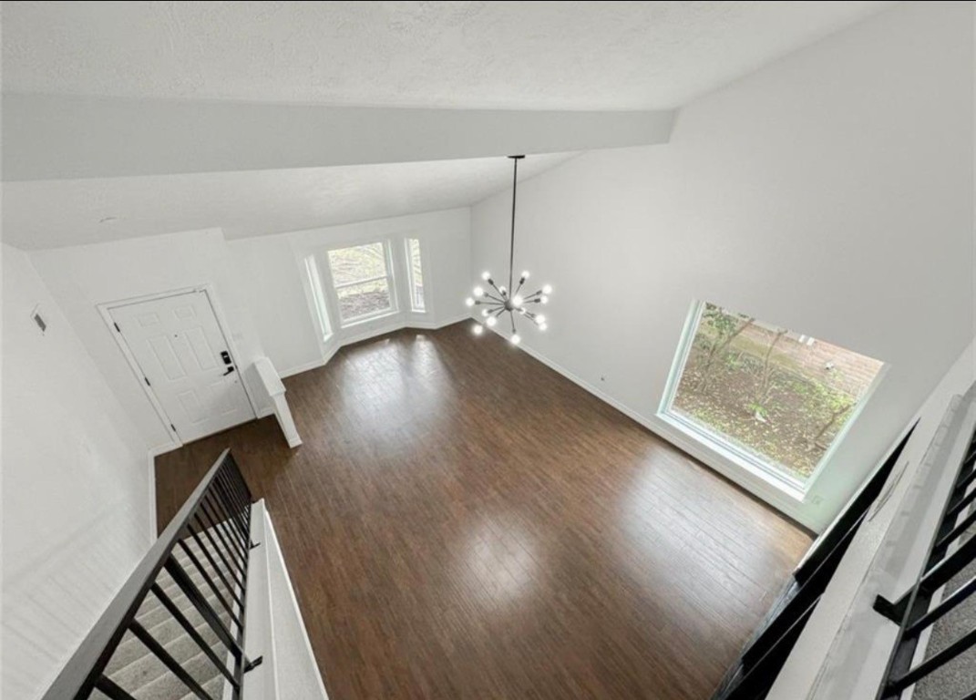 7311 Fuchsia Lane Humble, TX 77346 - Photo 24 of 38 wooden floor in an empty room with a window