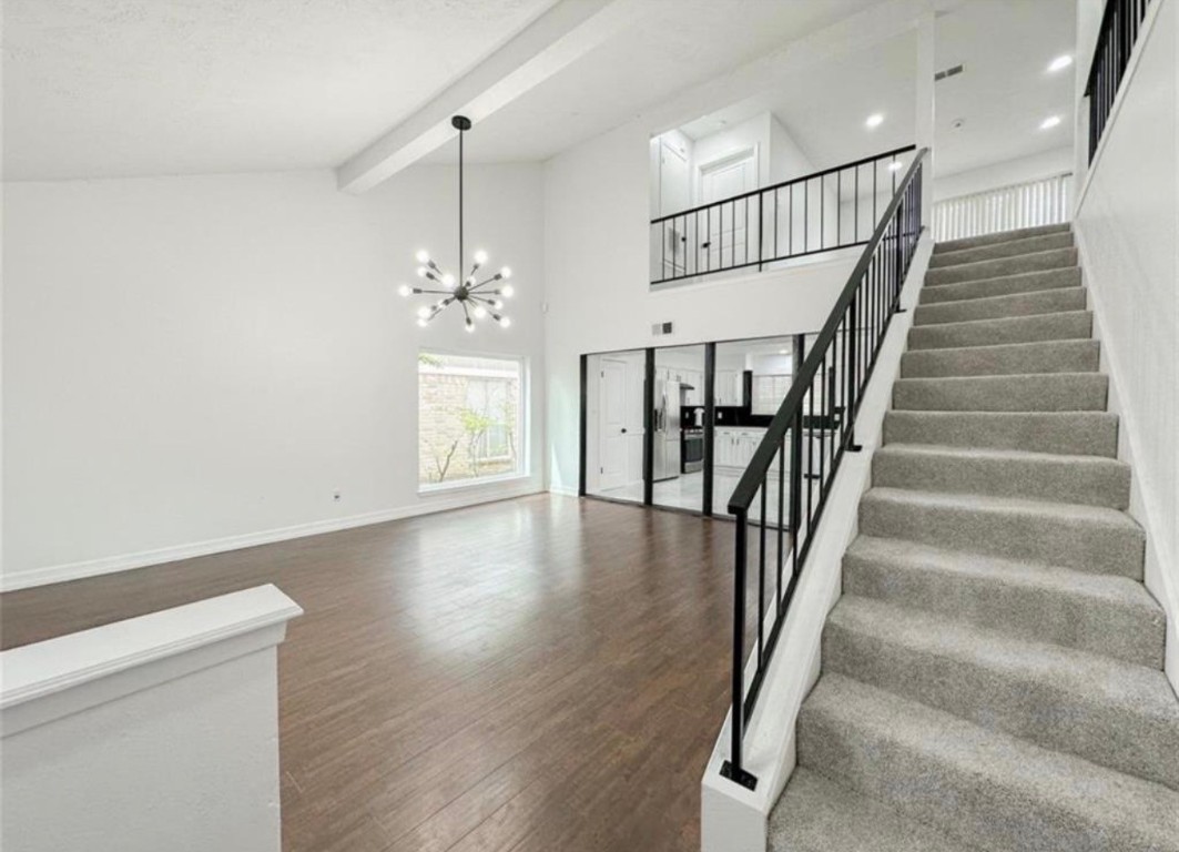 7311 Fuchsia Lane Humble, TX 77346 - Photo 5 of 38 a view of entryway and hall with wooden floor