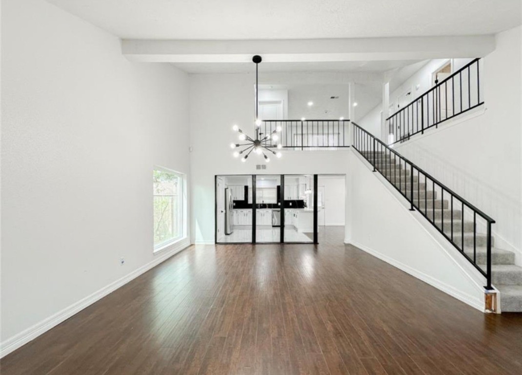 7311 Fuchsia Lane Humble, TX 77346 - Photo 6 of 38 a view of an entryway with wooden floor