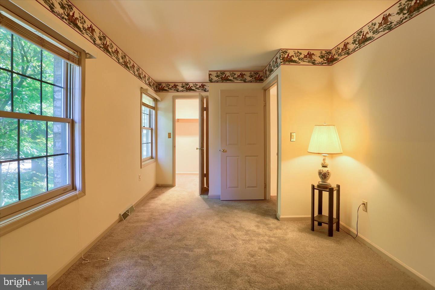 1300 Sand Hill Road Hummelstown, PA 17036 - Photo 15 of 24 a view of a hallway with wooden floor and door