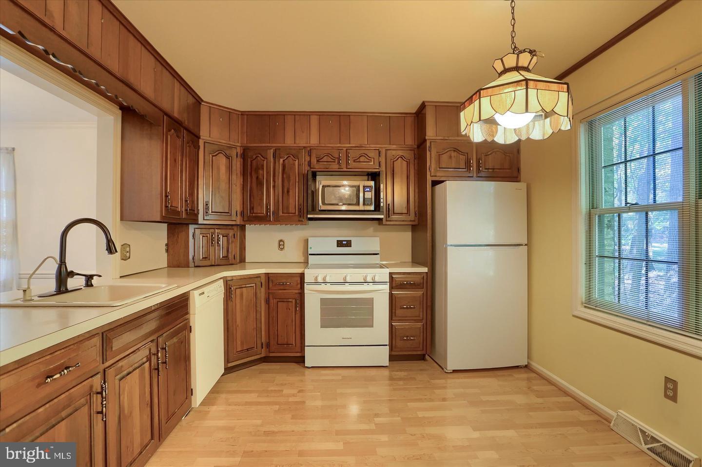 1300 Sand Hill Road Hummelstown, PA 17036 - Photo 4 of 24 a kitchen with stainless steel appliances granite countertop a refrigerator and a stove top oven