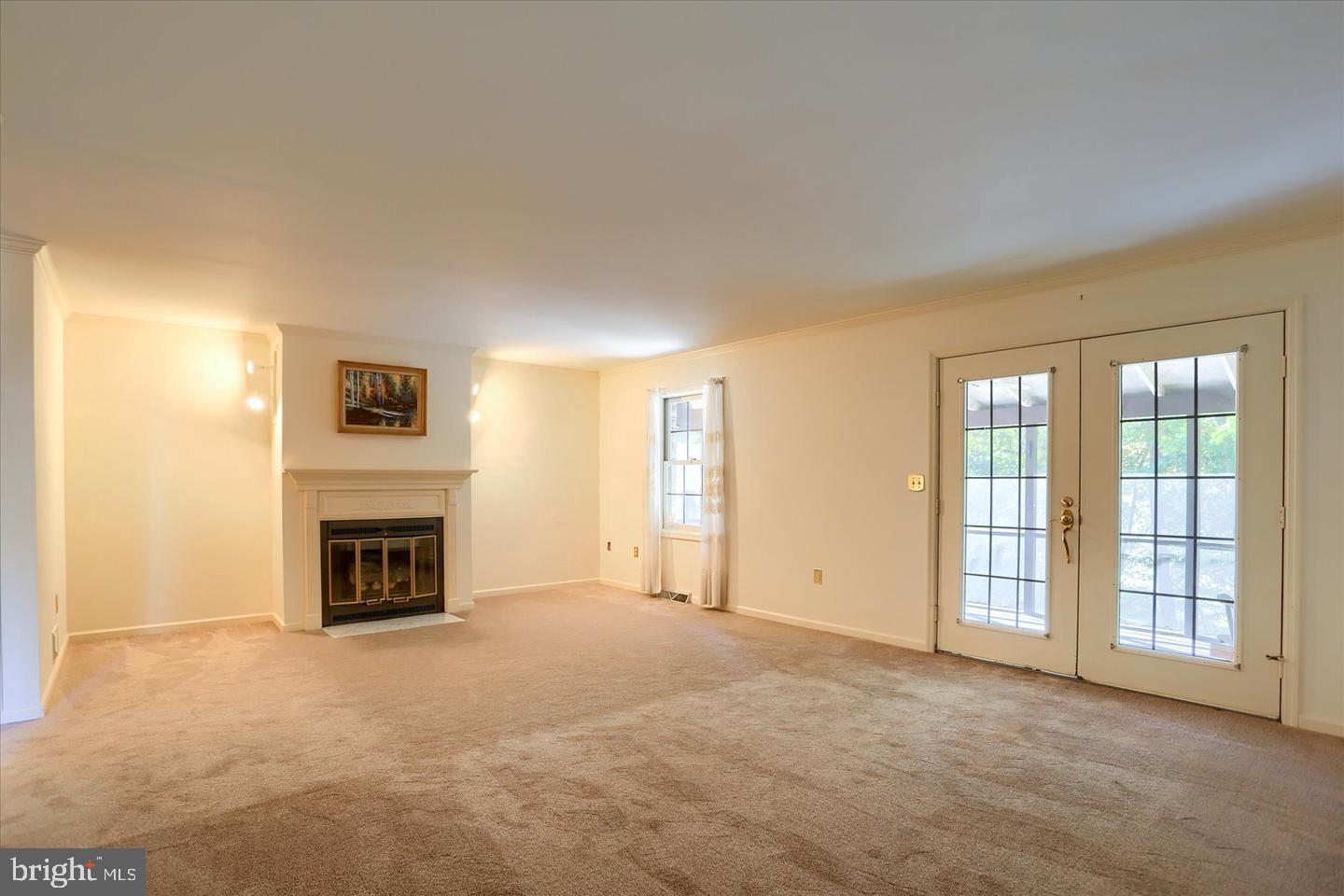 1300 Sand Hill Road Hummelstown, PA 17036 - Photo 9 of 24 a view of an empty room with a fireplace and a window