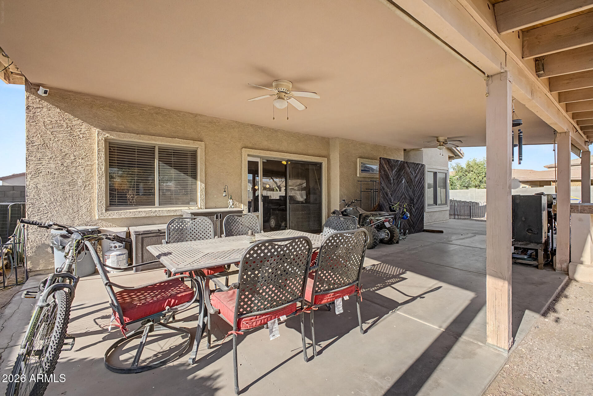 5301 West Grenadine Road Laveen, AZ 85339 - Photo 27 of 37 a view of a dining room with furniture window and outside view