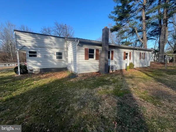 a front view of house with yard