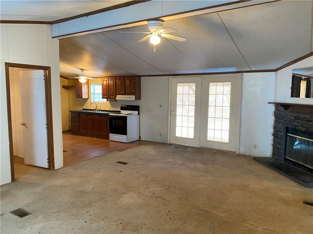 82 Old Brick Road West Alexander, PA 15376 - Photo 2 of 17 a large kitchen with a stove and a refrigerator