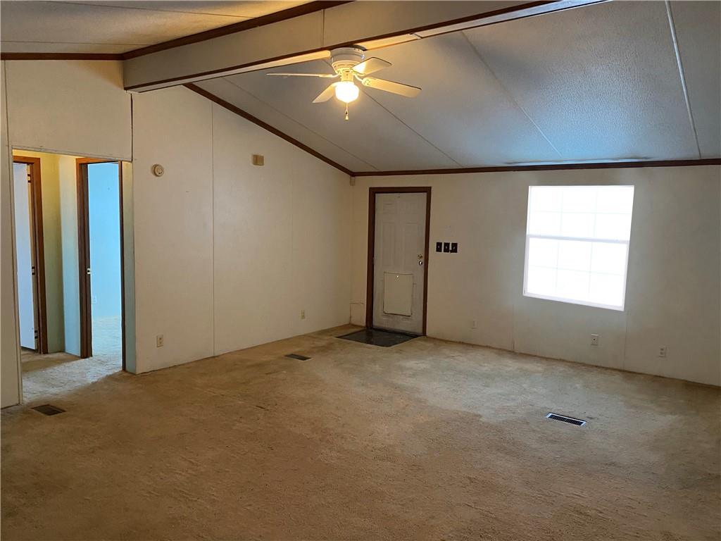 82 Old Brick Road West Alexander, PA 15376 - Photo 4 of 17 a view of an empty room with window and stairs