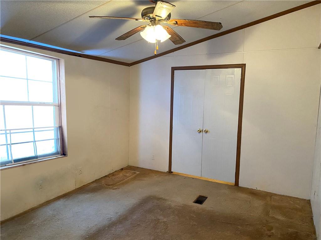 82 Old Brick Road West Alexander, PA 15376 - Photo 10 of 17 an empty room with a window and a fan
