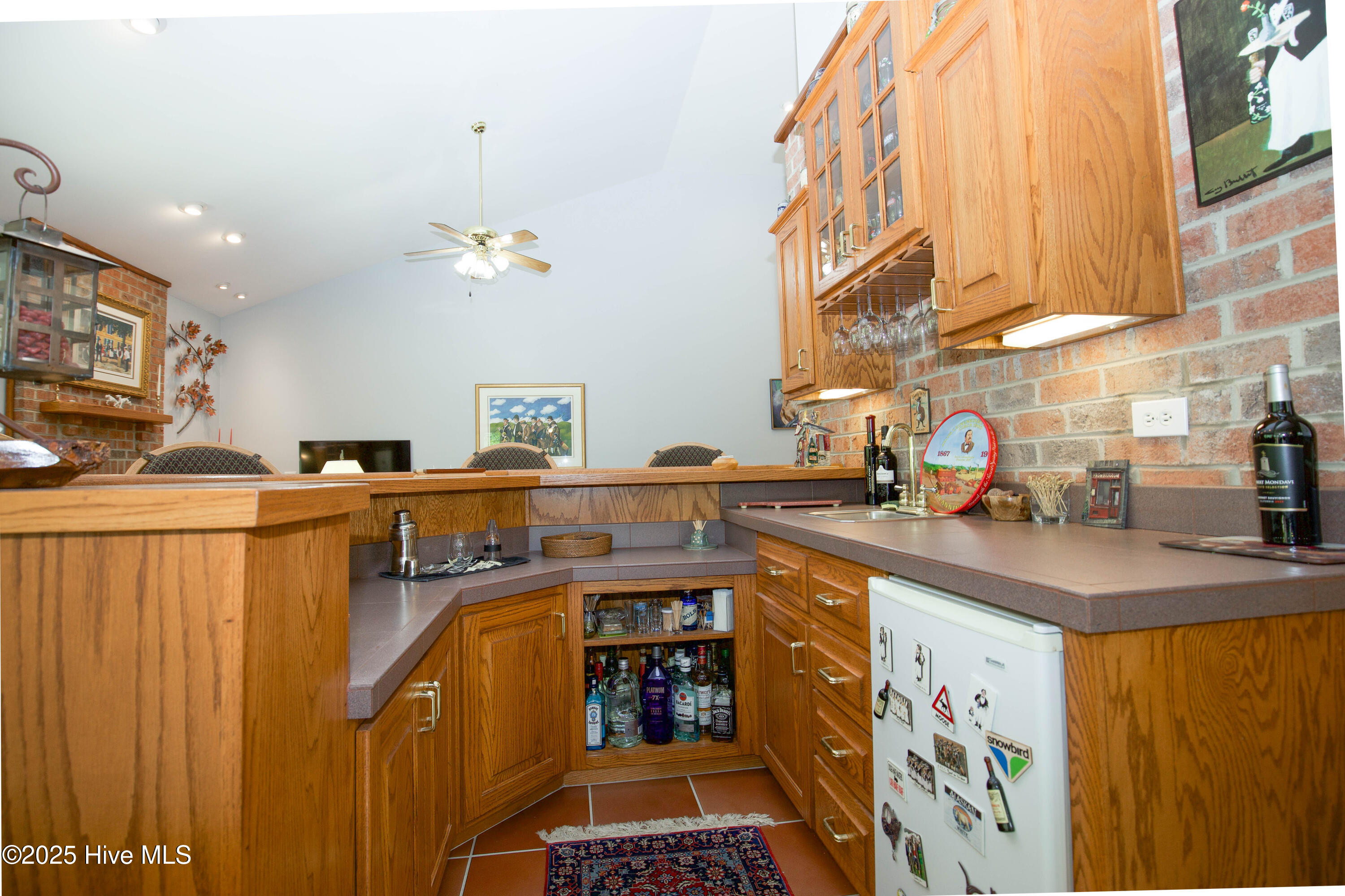 17 Troon Drive Pinehurst, NC 28374 - Photo 37 of 105 Bar nook w/fridge & storage