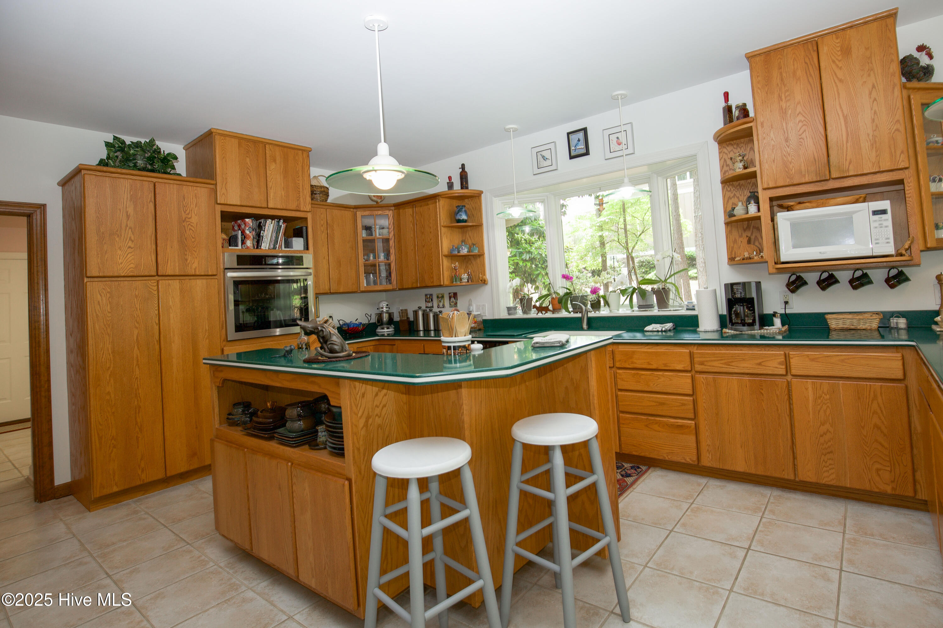 17 Troon Drive Pinehurst, NC 28374 - Photo 39 of 105 Kitchen seating area with gas cooktop