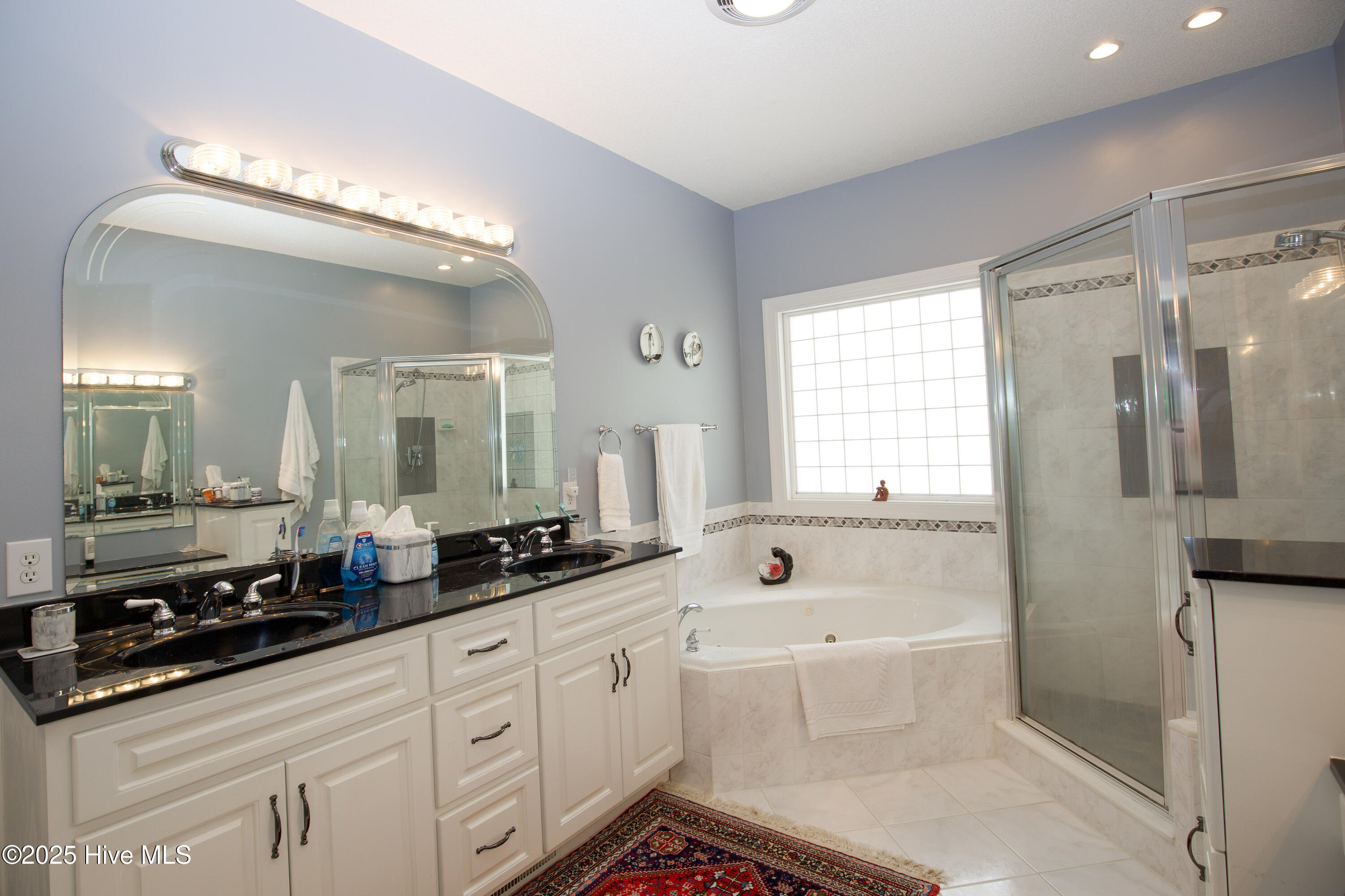 17 Troon Drive Pinehurst, NC 28374 - Photo 61 of 105 Primary Bathroom soaking Jacuzzi tub, walk in shower