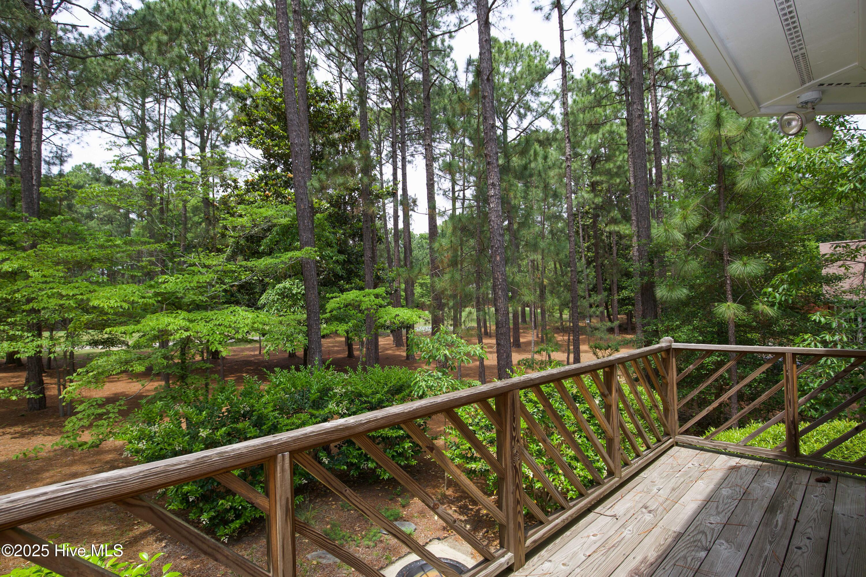 17 Troon Drive Pinehurst, NC 28374 - Photo 70 of 105 Deck area overlook yard