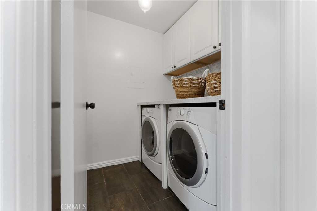 8180 Manitoba Street, Unit 330 Playa del Rey, CA 90293 - Photo 12 of 31 a view of a hallway with washer and dryer
